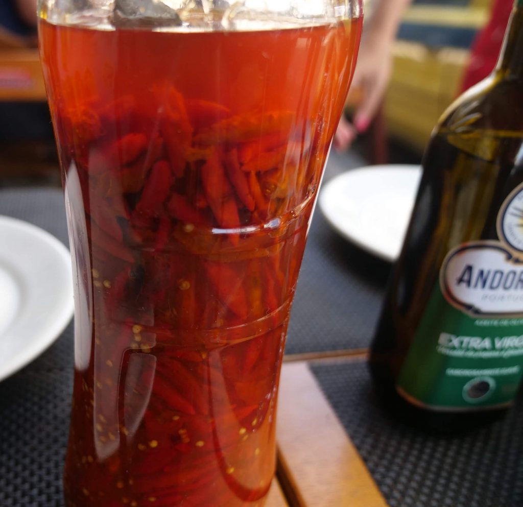 Entire-Bottle-of-Chilis-in-Oil-at-Bar-Cafe-Rex.jpeg